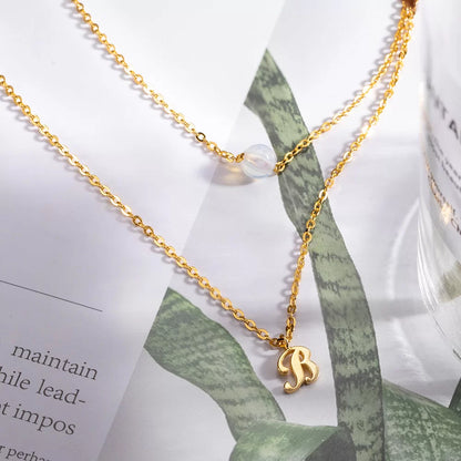 Personalized initial necklace with moonstone birthstone