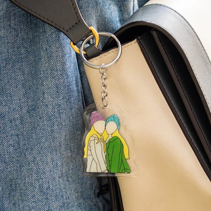 a custom of two women faceless portrait keychain