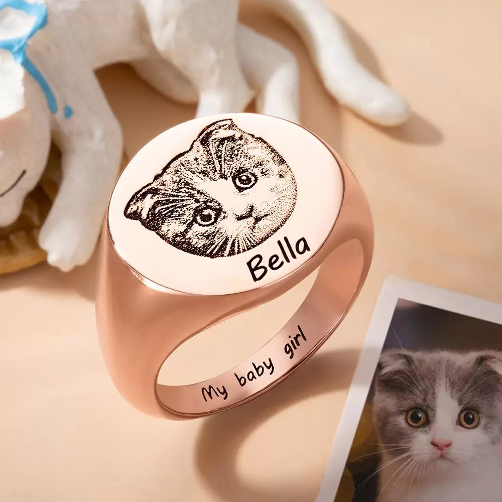 Rose gold personalized signet ring engraved with pet portrait, name, and inside message