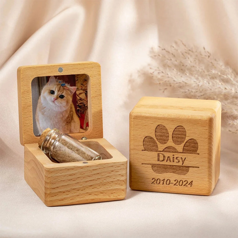 Personalized wooden pet memorial box with engraved name and compact square design