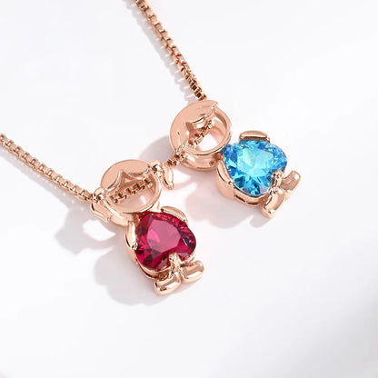 Close up custom mother necklace with two heart birthstone charms in rose gold