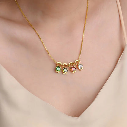 Family birthstone necklace with multiple children charms in gold, personalized mom jewelry