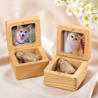 Two wooden custom boxes with pet photos on a soft background