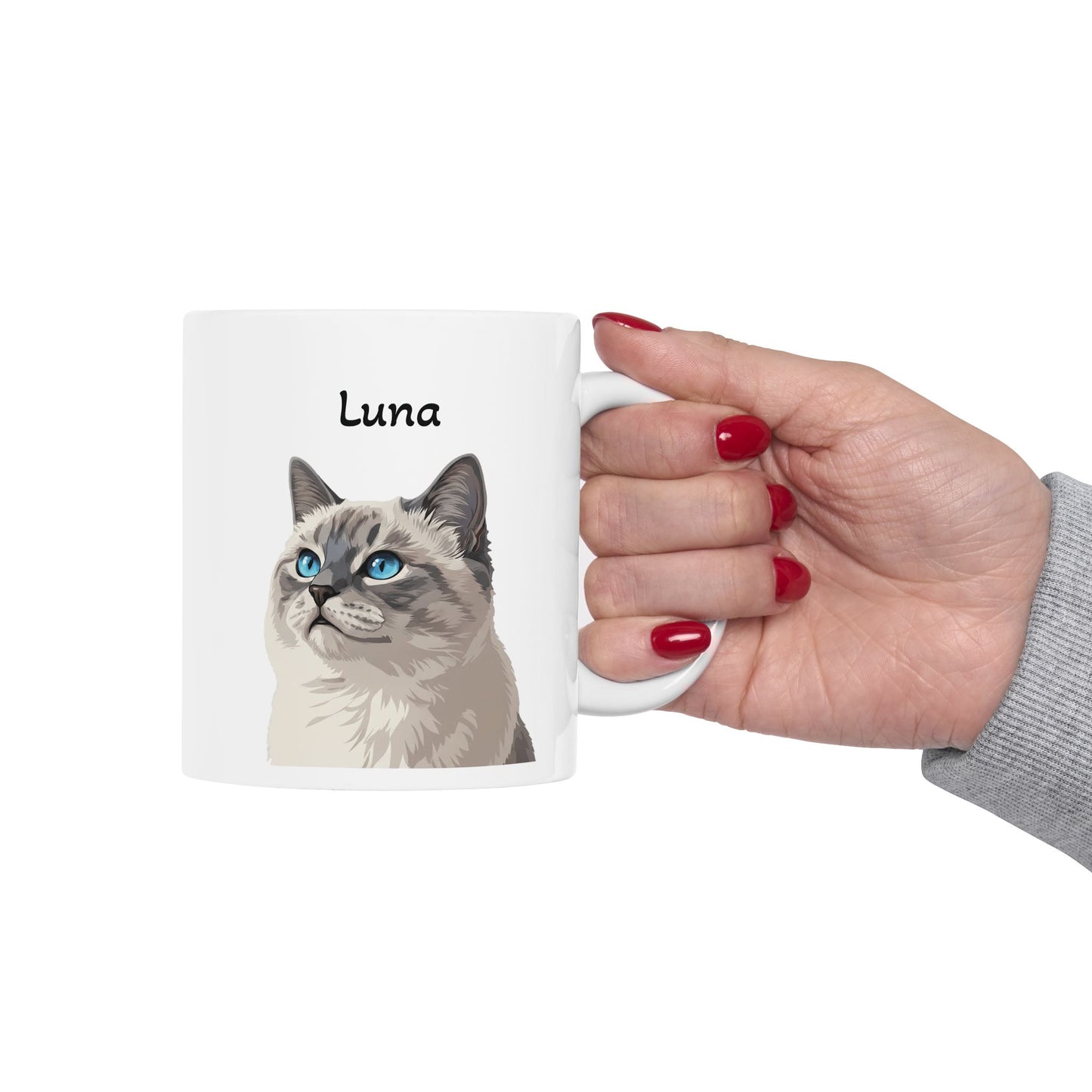 Woman holding a personalized Siamese cat portrait mug with the name “Luna”