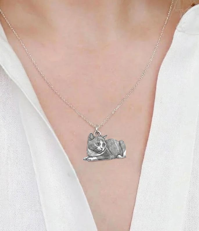 a woman is wearing custom pet photo silver
