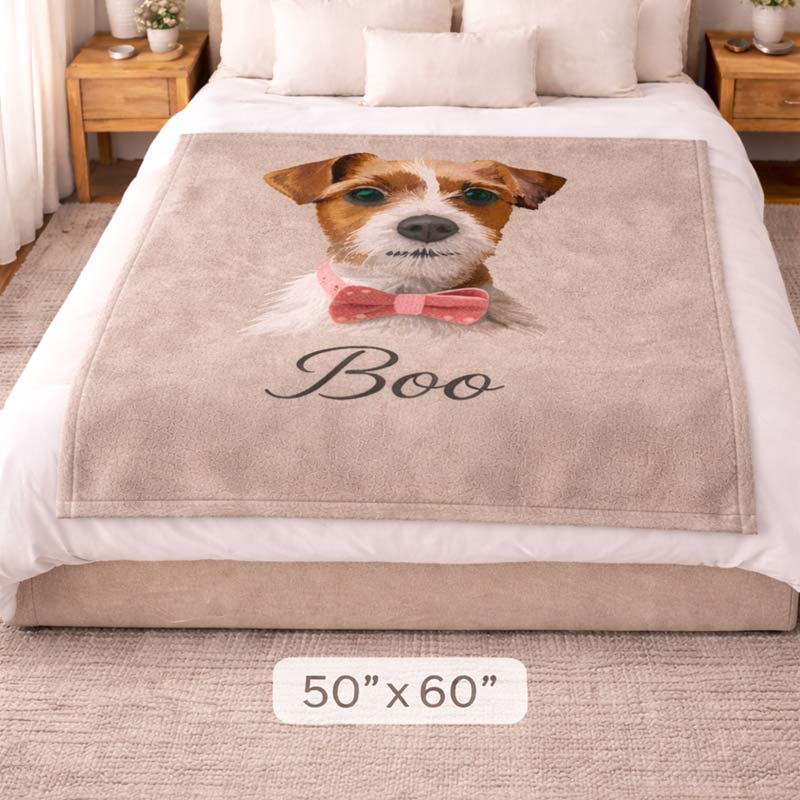 Beige blanket with a dog illustration and 'Boo' text on a bed size 50x60 inch