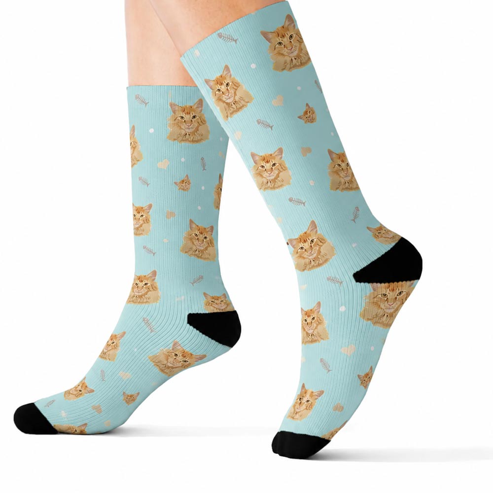 Custom pet face crew socks with orange cat portrait on pastel blue socks