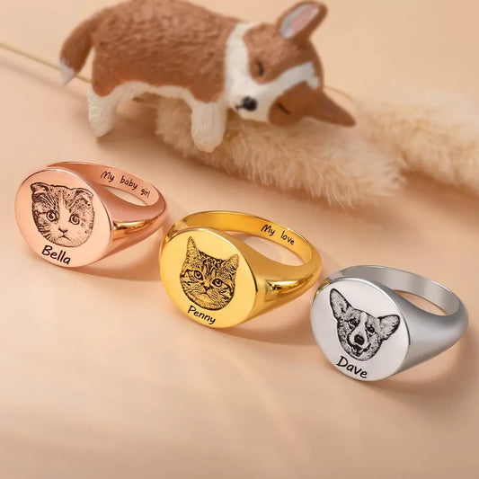 Custom pet portrait signet rings in silver, gold, and rose gold with engraved pet names