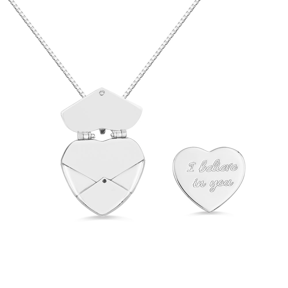 A silver custom heart shaped envelope  necklace with  a heart message 