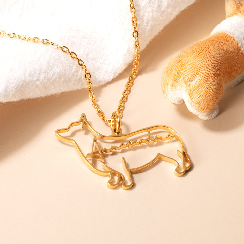 A custom gold Corgis outline pendant necklace with it's name 