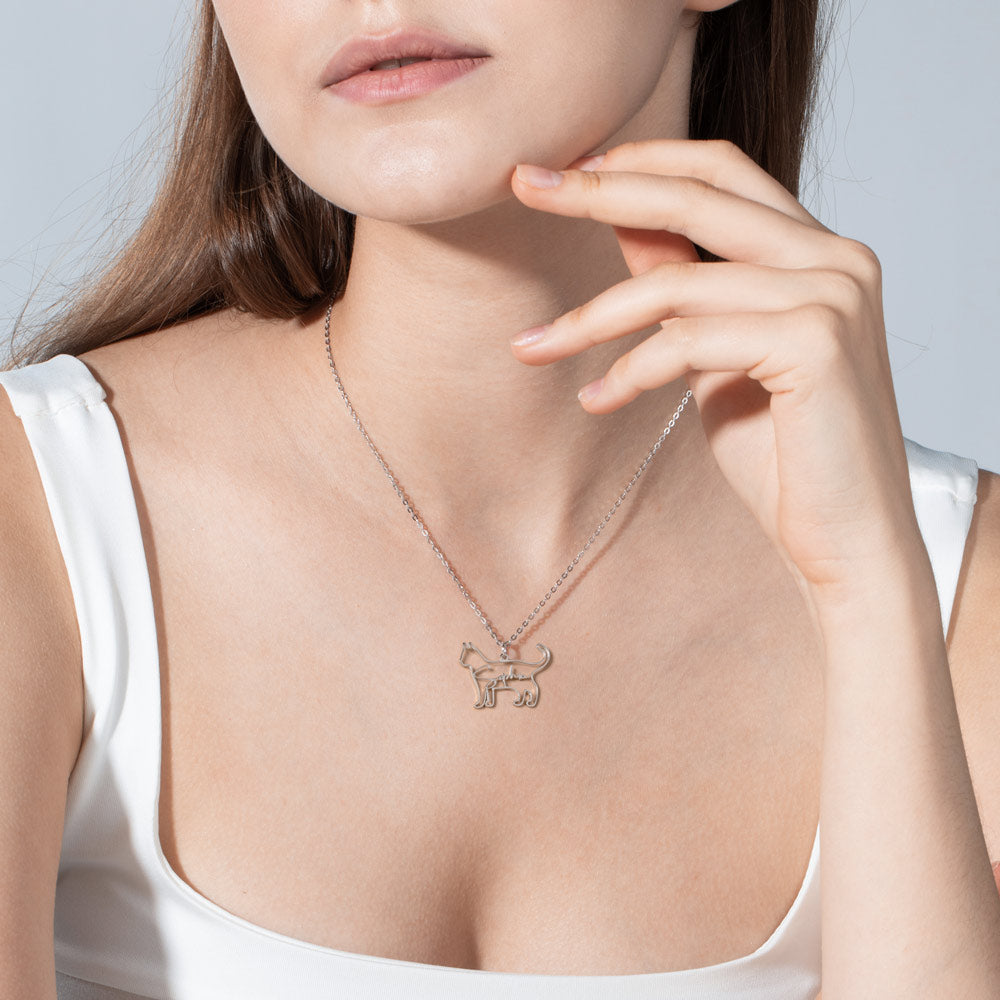 A woman is wearing a custom dog breed named Sophia necklace
