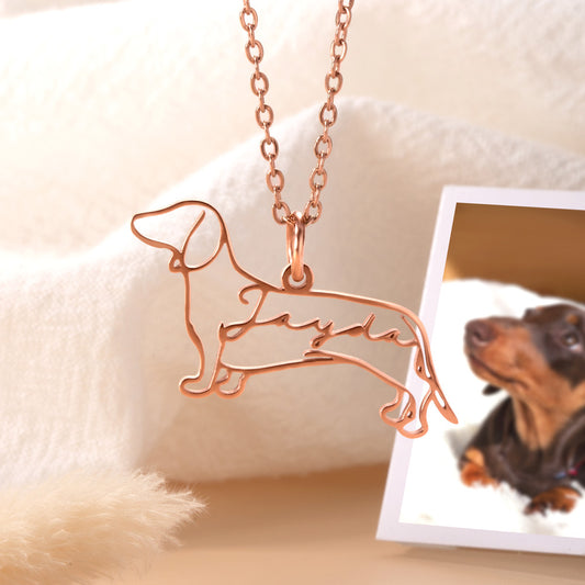 A custom red rose Dachshund outline pendant necklace with it's name Janda