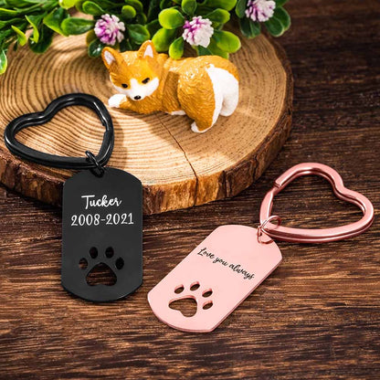 A pair of Custom red rose  dog tag keyring with text engraving and Custom  black dog tag keyring with text engraving